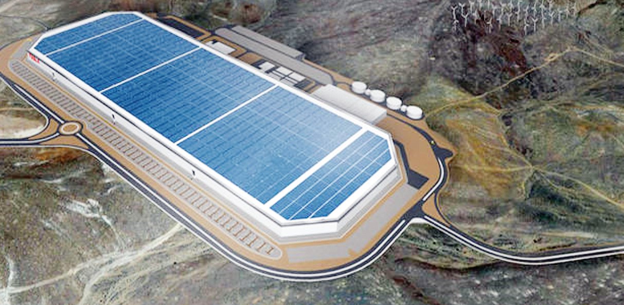 Wizualizacja fabryki akumulatorów i samochodów elektrycznych firmy Tesla, Gigafactory-
1 w Nevadzie, USA. Docelowo zakładane jest zasilanie zakładu z paneli słonecznych.
Budowa fabryki jest na ukończeniu, ale zakład już osiągnął poziom produkcji seryjnej, co
prawda po około 8-mio miesięcznym opóźnieniu wobec planów. Źródło: https://insideevs.
com/gigafactory-1-fi nally-getting-rooftop-solar/